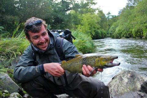 James Barry with the 100th salmon of the season for Kylemore Abbey Fishery, a well-coloured grilse in spawning livery that was released after a quick photo.