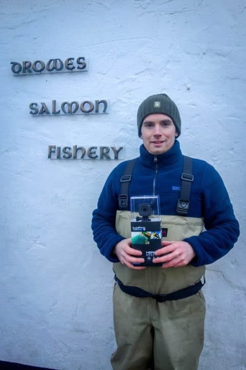 Eoin McManus with the GoPro camera prize for the first caught and released fish from the river this season.