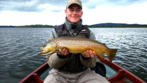 Michael Farrell with his trout of 8lbs plus caught using a dry sedge