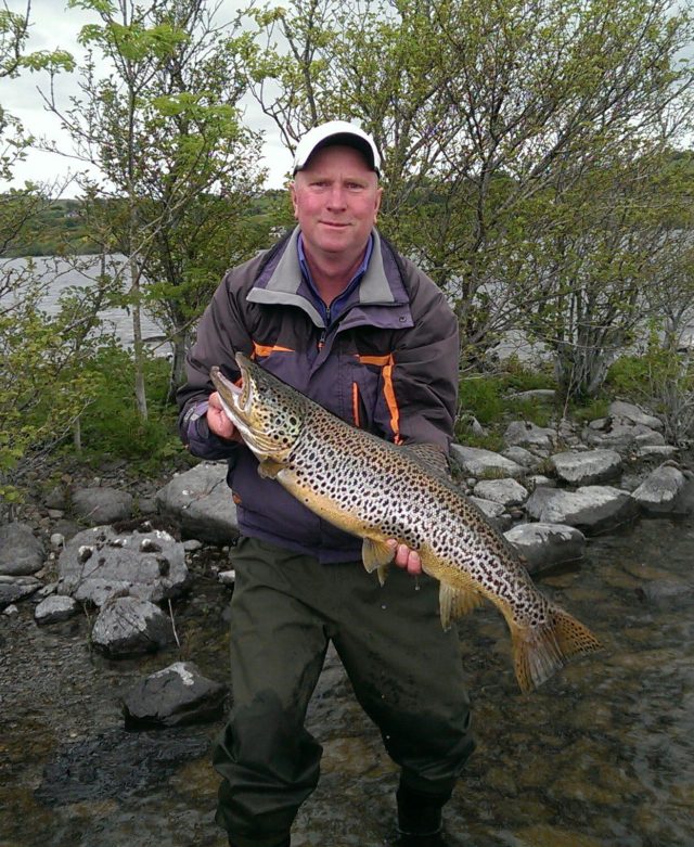 Paul Geraghty with a beautiful 13lbs Corrib trout he caught and released is our first joint 'Catch of the Week' winner