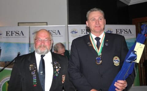 Silver Medal Winner Volker Claus Receiving His Awards from Philip Lustig 