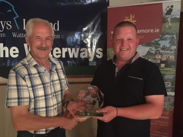 James Place, Manchester winner receiving trophy for first place from Brian McKeon Festival Committee.