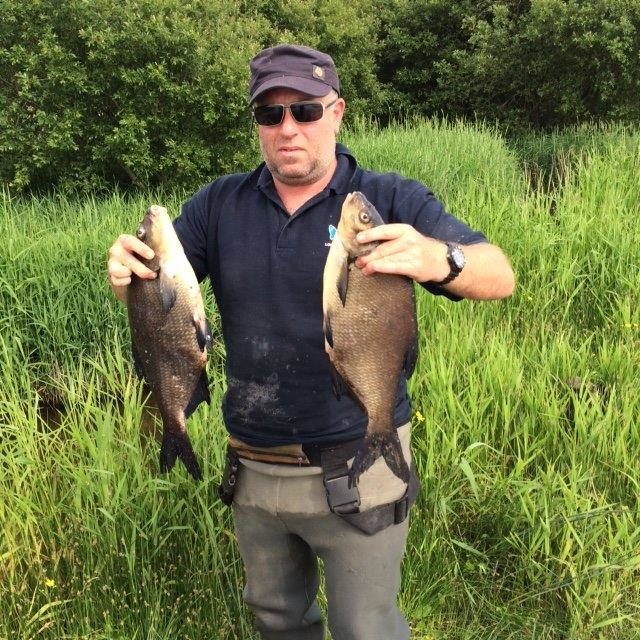Paul with a couple of nice Bream from his catch