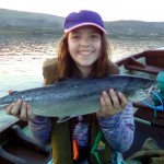 Miss Caitlin McAlister, while fishing with her Granddad, Mr. Jim Sayers, caught a fine 6 lbs. Salmon