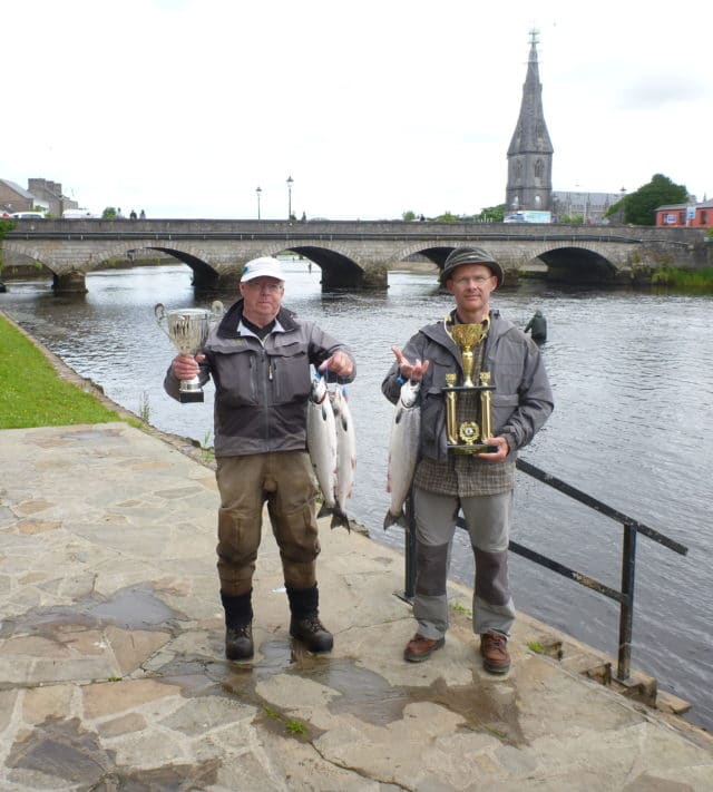 Raymond and Roland with their trophies