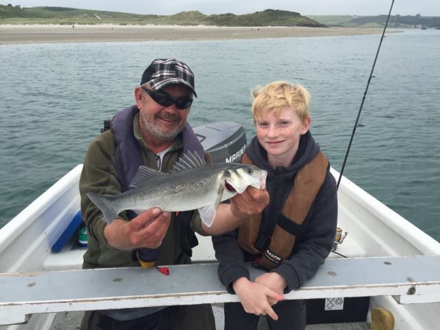 Conall with two of the fifteen bass caught yesterday