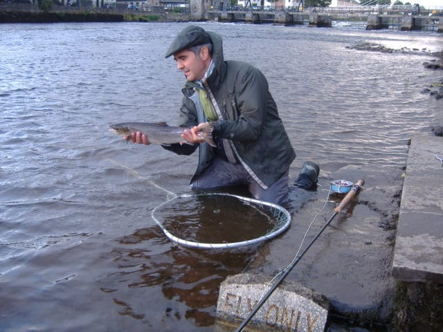Pino Messina, Italy, about to release one of his four Ridge Pool grilse