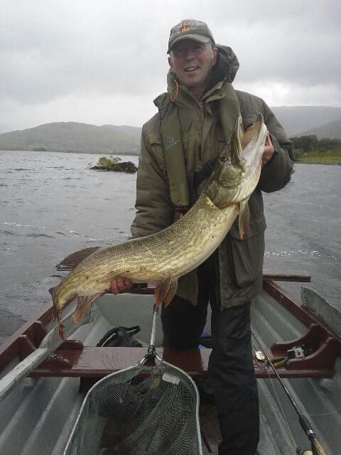 Angling guide Brian Joyce holds a beautiful 1.15m pike caught by Maxd Mallick from France on Lough Mask, September 2016