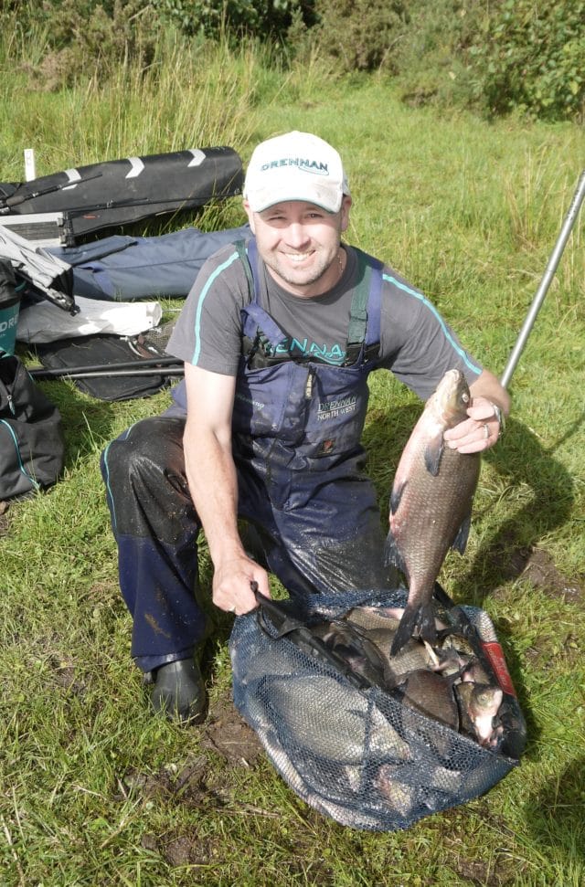 Steve Fleming on Bunerky Lake with some of his catch of 38.325kg at the same venue Steve Fleming on Bunerky Lake with some of his catch of 38.325kg at the same venue