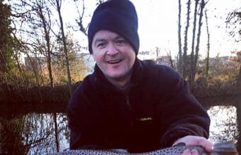 Paul O'Donnell with his cracking trout before he released it back