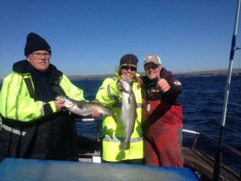 Max and his anglers pose with the catch