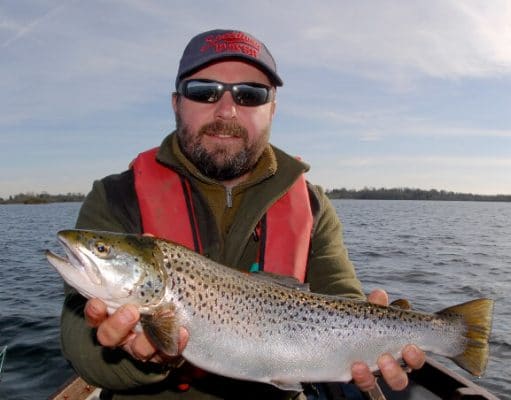 Angler poses with trout