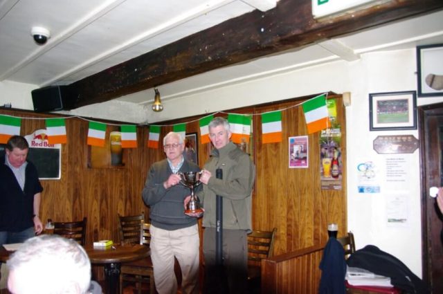 Mark Rogan is presented the Carrigavantry Cup