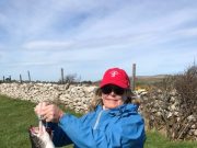 Warm weekend weather revitalises salmon fishing on Currane showing off the catch