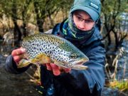 Christopher Defillon holding a beautiful wild trout from Lough Sheelin, March 20th