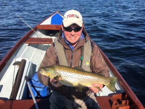 Gary McKiernan of Lough Sheelin guiding with one of the biggest trout that he caught this week on Sheelin (62cm)