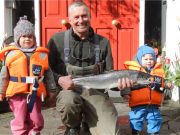 Family affair at Delphi at end of March Dad and kids pose with salmon