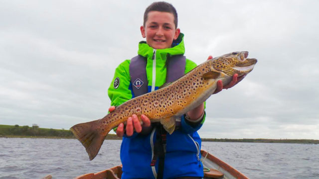 14 year old Eliot Thievenaz with the catch of a young lifetime - a fine trout of approx. 8lbs from Lough Mask while fishing with Philip Comber. The magnificent fish was sportingly released again. Well done Eliot!