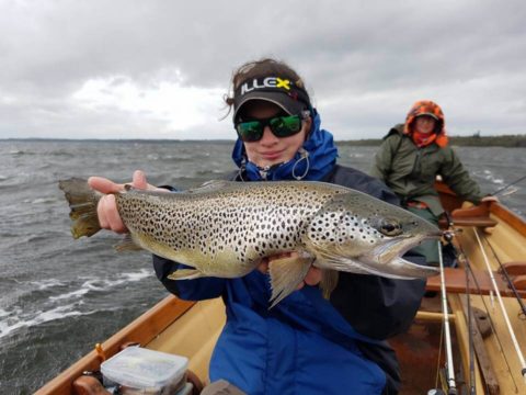 Gina Tanczos with her personal best for a brown trout (guided by Christopher Defillon)