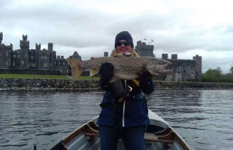 Good hatches of olives on Corrib, trout slow to react Angler poses with big trout