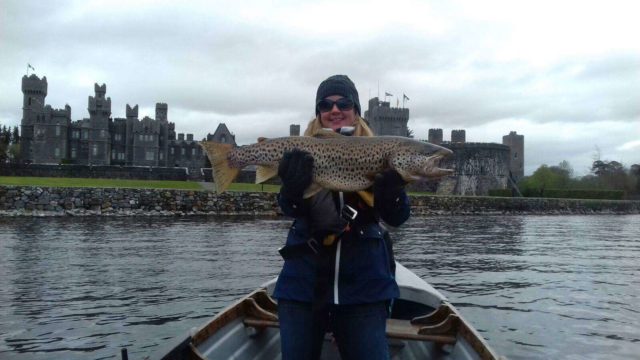 Angler poses with big trout