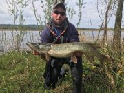 angler with a pike