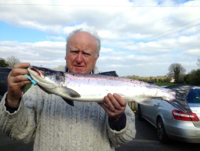 Angler poses with a salmon