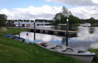 A calm looking River Shannon overlooking Portumna Bridge