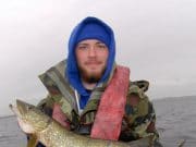 Stunt man tackles pike on fly at Derravarragh Sean Condren and pike caught on the fly