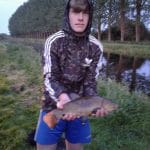 Byron_Martin__and_a_Tench_3lbs_8_oz[1]