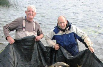 Mike and Kevin with a nice 215lb catch of Bream
