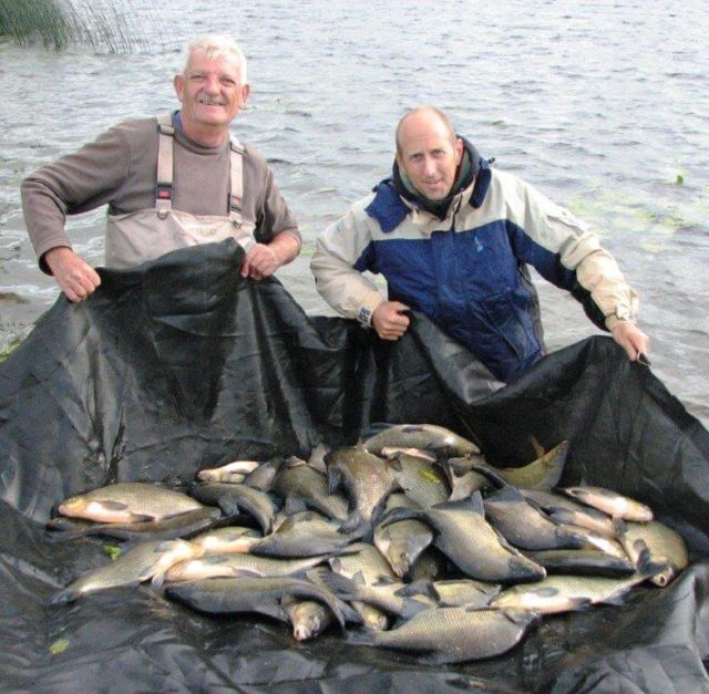 Mike and Kevin with a nice 215lb catch of Bream