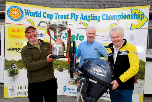 Winner of The World Cup Trout Fly Angling Championship, was Geoffrey Hylands from Banbridge , Co Down , reciving The World Cup, 3,000euro and a 15HP Yamaha Engine from Committee Chairman Billy Burke and Tom Staunton of R.S. Marine, Westport, Sponsor. Pic:Trish Forde.