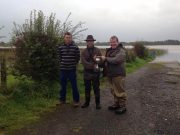 Mark Malone club secretary, Michael McDermott winner, Ronan Baggott chairperson presenting Winner with McCarthy Cup 2017