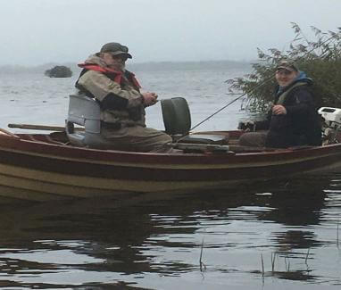 Taking shelter from the windy conditions, Craig Sheridan, Brady with his companion at the LSTPA Rehab. competition Sunday October 1st