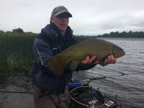 Nigel with a cracking Tench.