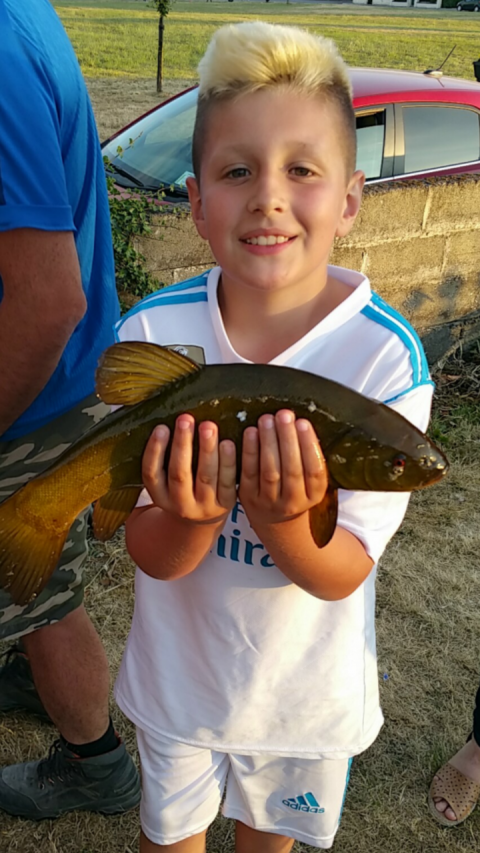 Oisin Carroll with another tench