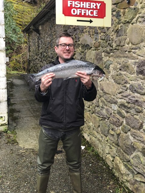 A very happy Ciaran Conroy with his first ever Atlantic salmon from the Delphi Fishery, a nice 7lbs 2oz springer. Note the absence of the adipose fin identifying it as a ranched salmon from the ranching programme at Delphi, which differentiates it from a wild fish, which are all released here.