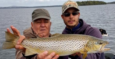 Christopher Defillon with his French visitor who landed this impressive autumn trout