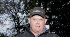 Angler showing his catch at Lough Owel