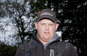 Angler showing his catch at Lough Owel