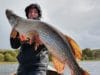 Patrick with his pike catch