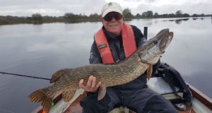 Freanch angler with pike cacth
