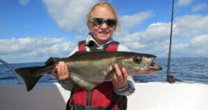 Jigging for pollack – Amy’s Fishing Adventures Amy with one of her pollack