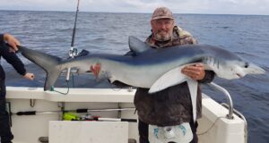 Daniel with one of several fine Blues amongst a catch of 22 on Silver Dawn.