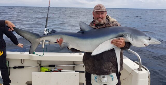 Daniel with one of several fine Blues amongst a catch of 22 on Silver Dawn.