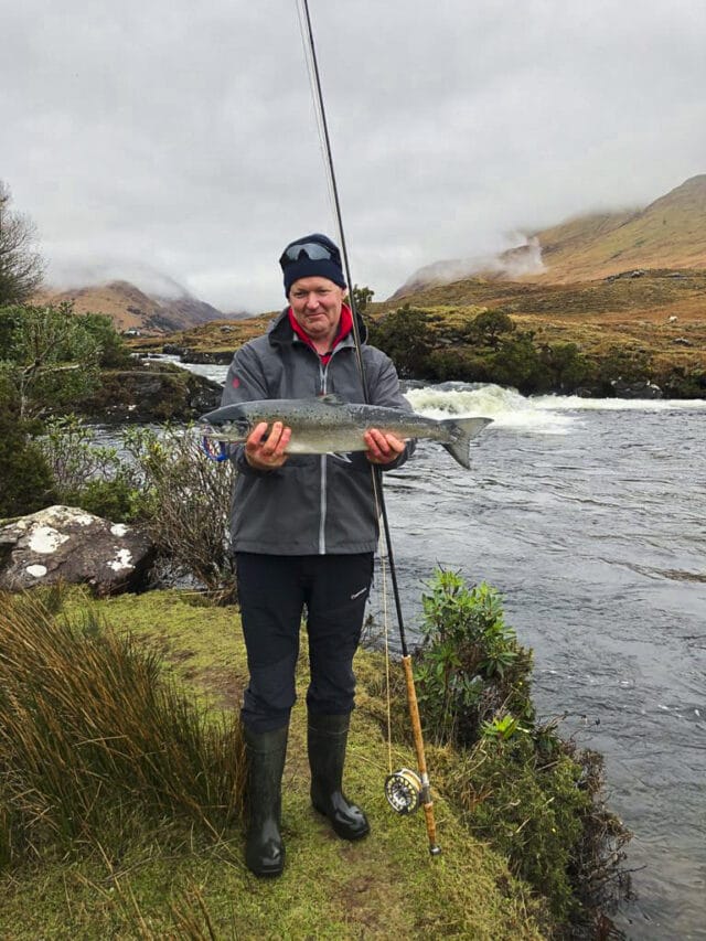Fishery manager David McEvoy with the first Delphi salmon of 2021