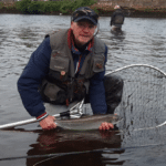 Daniel Mc Carthy, Athy, releasing a salmon at the Ridge Pool