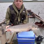 Glenn Woods with a Carrowmore salmon which was released