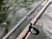 Great fishing on the Nore in huges hatches of fly A fly on a fly rod